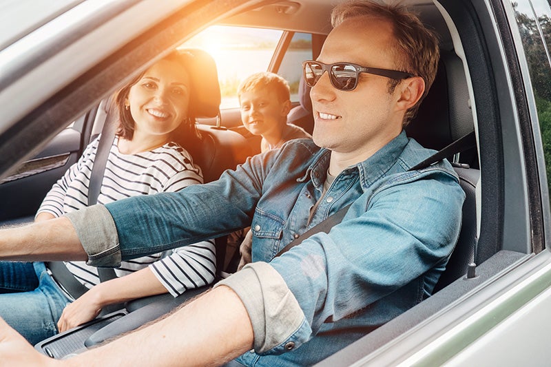 family riding in car